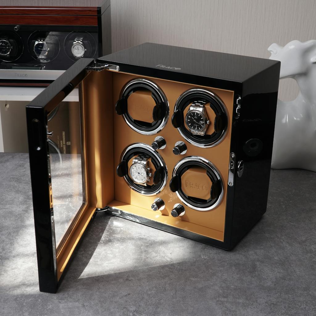 Luxurious watch winder showcasing elegant wristwatches in a sunlit room, perfect for fashion enthusiasts.